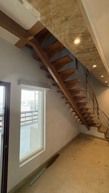 Staircase in 4 BHK Apartment at Rohtas Presidential Tower, Vibhuti Khand – for Rent