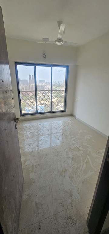 Room in 3 BHK Apartment at Modirealty Wisteria, Kandivali West – for Sale