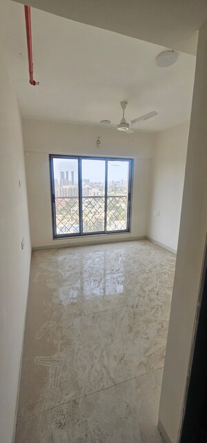 Room in 3 BHK Apartment at Modirealty Wisteria, Kandivali West – for Sale