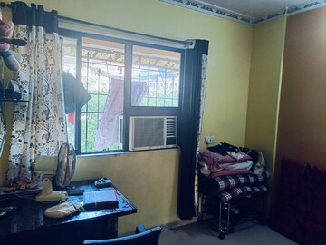 Living Room in 1 BHK Apartment at Highland Residency CHSL, Balkum Pada – for Rent
