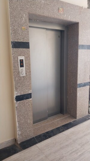 Building Lobby in 1.5 BHK Apartment at Techman Moti Residency Phase III, Raj Nagar Extension – for Sale