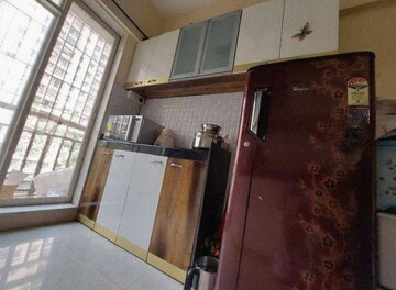 Kitchen in 2 BHK Apartment at Rosa Gardenia, Ghodbunder Road – for Rent