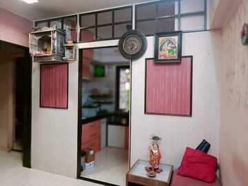 Living Room in 1.5 BHK Apartment at Chincholi Apartment, Malad West – for Rent