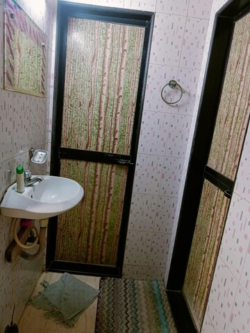 Bathroom in 1.5 BHK Apartment at Chincholi Apartment, Malad West – for Rent