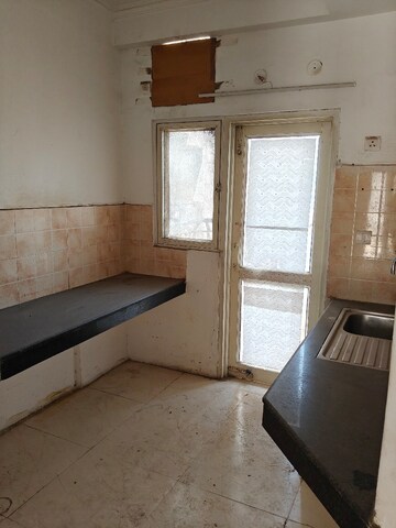 Kitchen in 2.5 BHK Apartment at AWHO Shanti Vihar, Sector 95 – for Rent