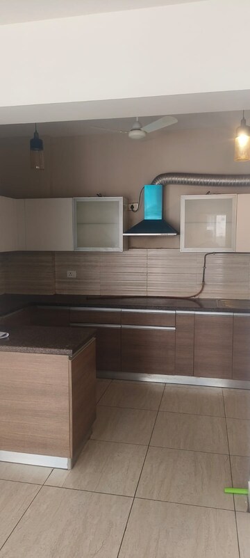 Kitchen in 3 BHK Apartment at ABA Cleo County, Sector 121 – for Rent