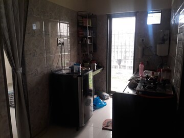 Kitchen in 1 BHK Apartment at Ritu Gardenia, Naigaon East – for Sale