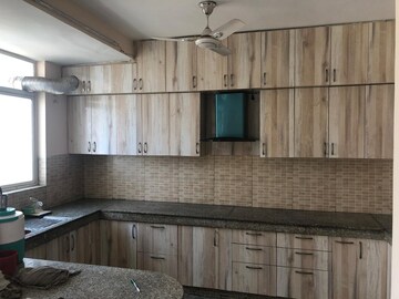 Kitchen in 3 BHK Apartment at Raheja Vedaanta, Sector 108 – for Rent