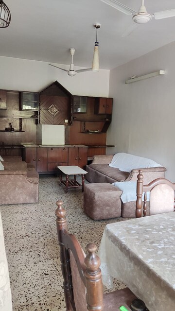 Living Room in 1 BHK Apartment at Dhoop Chaon Society, Andheri West – for Rent