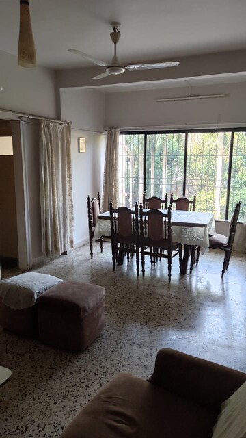 Living Room in 1 BHK Apartment at Dhoop Chaon Society, Andheri West – for Rent
