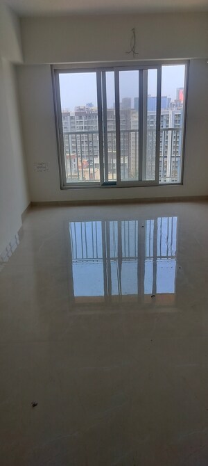 Room in 2 BHK Apartment at Zee Ashtavinayak, Andheri West – for Sale