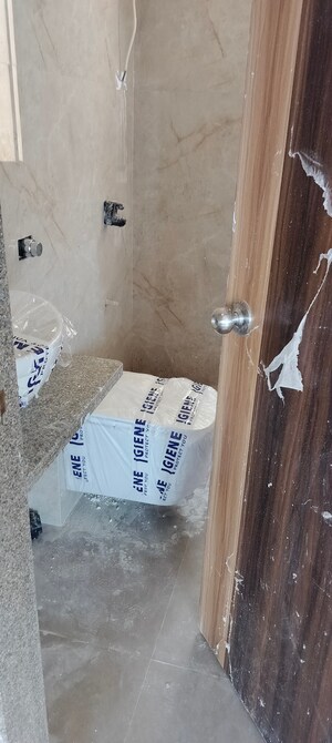 Bathroom in 2 BHK Apartment at Zee Ashtavinayak, Andheri West – for Sale