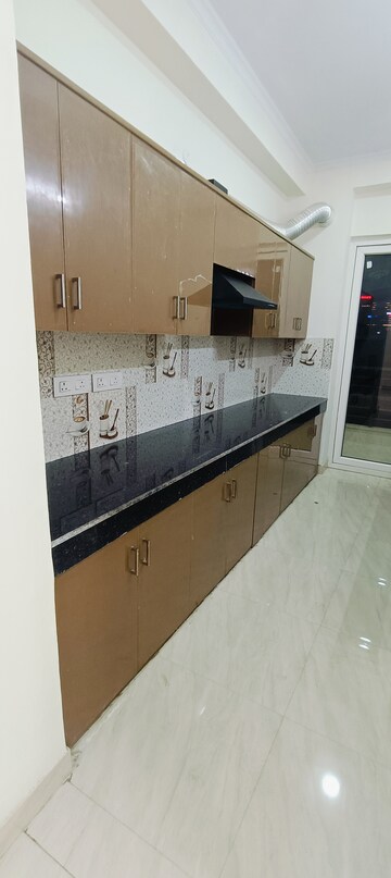 Kitchen in 2 BHK Builder Floor at Ansal API Esencia, Sector 67 – for Rent