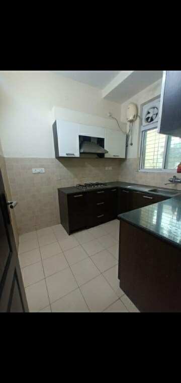 Kitchen in 3 BHK Builder Floor at Ansal API Esencia, Sector 67 – for Rent