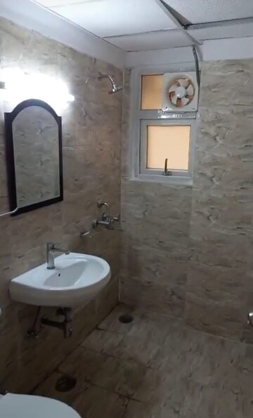 Bathroom in 2 BHK Apartment at Vasundhara Sector 1 – for Rent