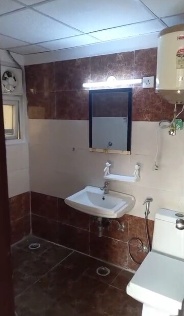 Bathroom in 2 BHK Apartment at Vasundhara Sector 1 – for Rent