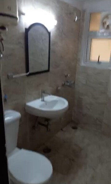 Bathroom in 2 BHK Apartment at Vasundhara Sector 1 – for Rent