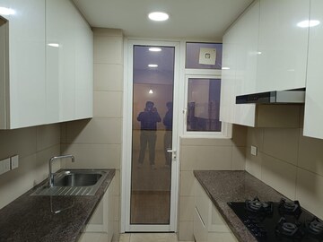 Kitchen in 3 BHK Builder Floor at Ansal API Esencia, Sector 67 – for Rent
