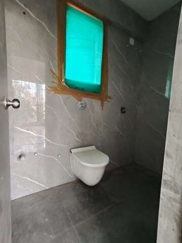 Bathroom in 2 BHK Apartment at Sonal Shree Manik Vishwa, Dahisar West – for Sale