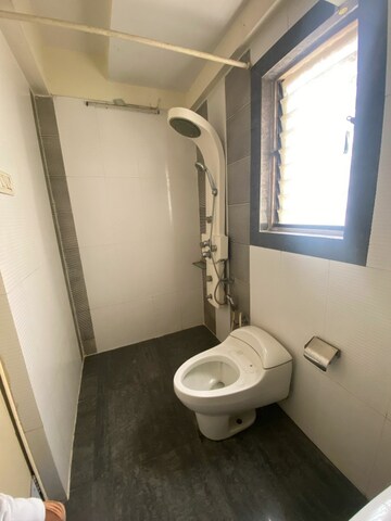 Bathroom in 3 BHK Apartment at Hiranandani Garden Brentwood, Powai – for Rent