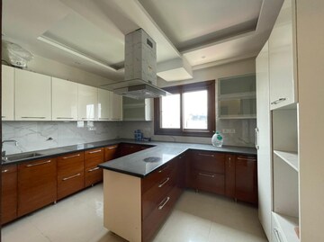 Kitchen in 4 BHK Apartment at Khanpur – for Sale