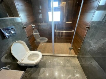 Bathroom in 4 BHK Apartment at Khanpur – for Sale