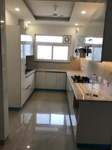 Kitchen in 3 BHK Builder Floor at Ansal API Esencia, Sector 67 – for Rent