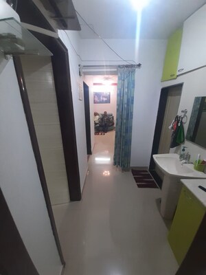 Building Lobby in 2 BHK Apartment at Vrindavan Garden Co Hs Society, Kalyan West – for Sale