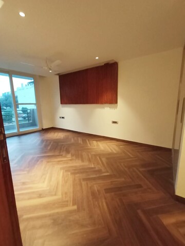 Bedroom in 4 BHK Builder Floor at Ansal API Esencia, Sector 67 – for Rent