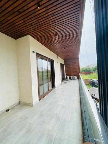 Balcony in 4 BHK Builder Floor at Ansal API Esencia, Sector 67 – for Rent