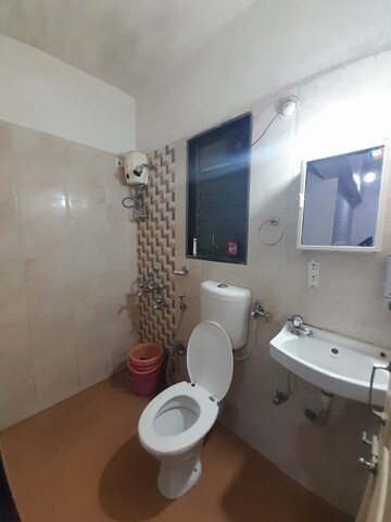 Bathroom in 2 BHK Apartment at Hubtown Greenwoods, Vartak Nagar – for Sale