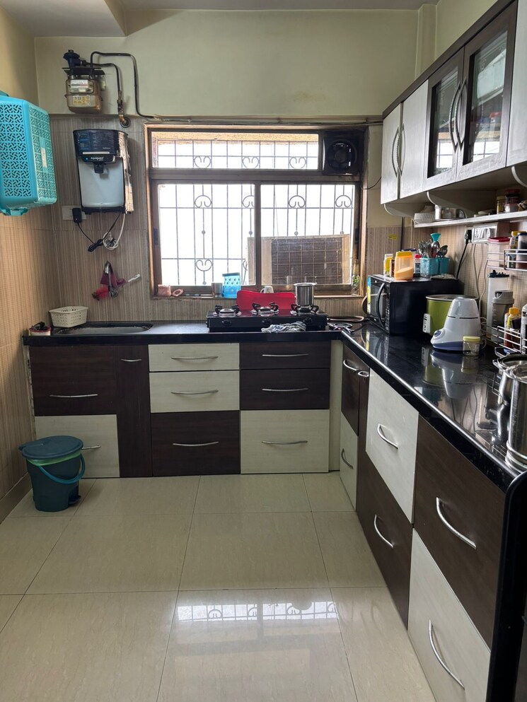 Kitchen, runwal-garden-city 3 Bedroom 1300 Sq.Ft. Apartment In Balkum Pada Thane 8577110