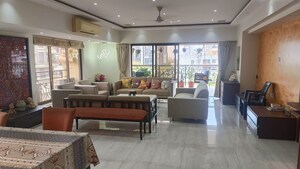 Living Room in 4 BHK Apartment at Santacruz West – for Sale