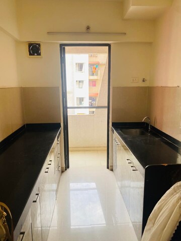 Kitchen in 1 BHK Apartment at Lodha Palava City Lakeshore Greens, Dombivli East – for Rent