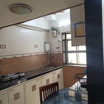 Kitchen in 1 BHK Apartment at Venus Towers Andheri West, Ambivali – for Sale