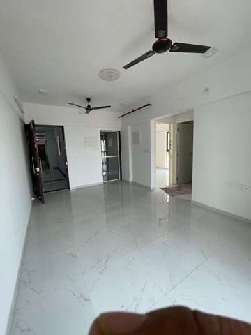 Living Room in 2 BHK Apartment at Runwal Gardens, Dombivli East – for Rent