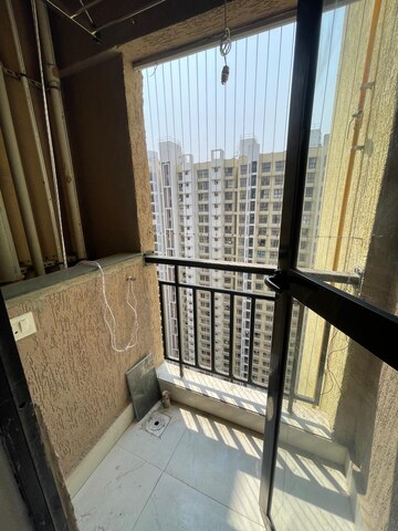 Balcony in 2 BHK Apartment at Runwal Gardens, Dombivli East – for Rent