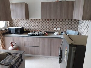 Kitchen in 2 BHK Apartment at ROF Aalayas, Sector 102 – for Sale