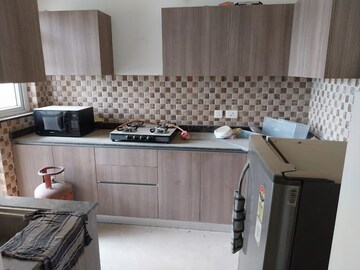 Kitchen in 2 BHK Apartment at ROF Aalayas, Sector 102 – for Sale