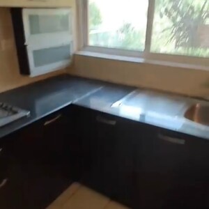 Kitchen in 3 BHK Apartment at Ansal API Esencia, Sector 67 – for Sale