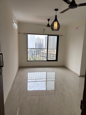 Room in 2 BHK Apartment at Chaitanya Anand Lunkhod CHSL, Andheri West – for Sale
