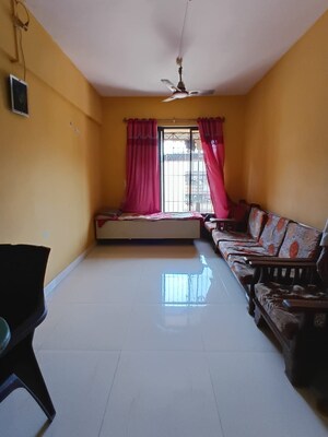 Living Room in 1 BHK Apartment at Kalwa – for Sale