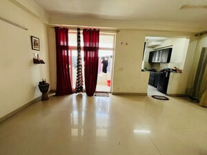 Living Room in 2 BHK Apartment at Amrapali Silicon City, Sector 76 – for Sale