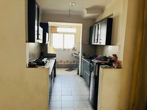Kitchen in 2 BHK Apartment at Amrapali Silicon City, Sector 76 – for Sale