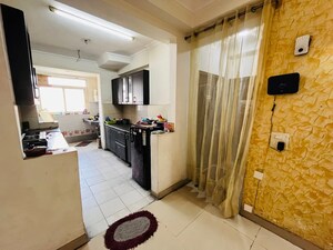 Living Room in 2 BHK Apartment at Amrapali Silicon City, Sector 76 – for Sale