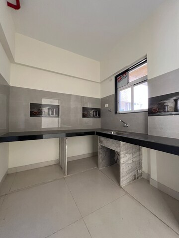 Kitchen in 2 BHK Apartment at Parsik Nagar – for Sale