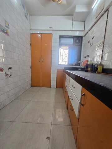 Kitchen in 2 BHK Apartment at Parsik Nagar – for Sale