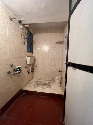 Bathroom in 2 BHK Apartment at Kharegaon – for Sale