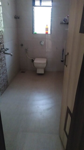 Bathroom in 2 BHK Apartment at Rajesh Raj Sarovar, Dahisar West – for Rent