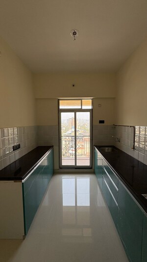 Kitchen in 2 BHK Apartment at Moraj Prive, Kopar Khairane – for Sale